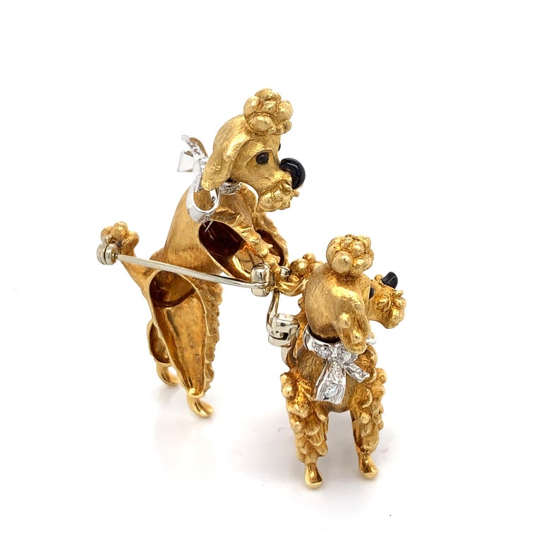 Cartier set of Diamond and Gold Dog Brooches