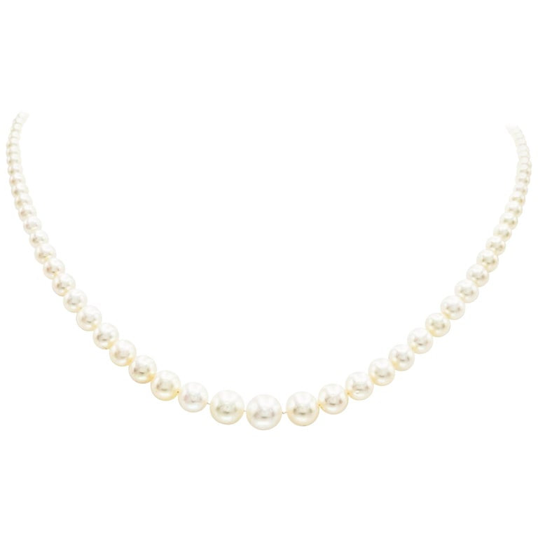 Natural and Cultured Pearl Necklace with Platinum and Diamond Clasp