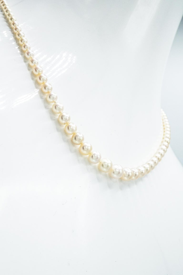 Natural and Cultured Pearl Necklace with Platinum and Diamond Clasp