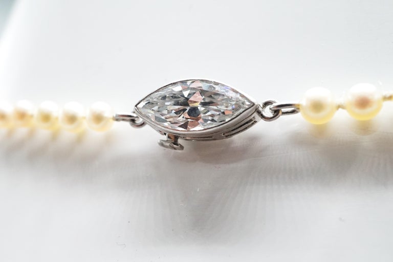 Natural and Cultured Pearl Necklace with Platinum and Diamond Clasp